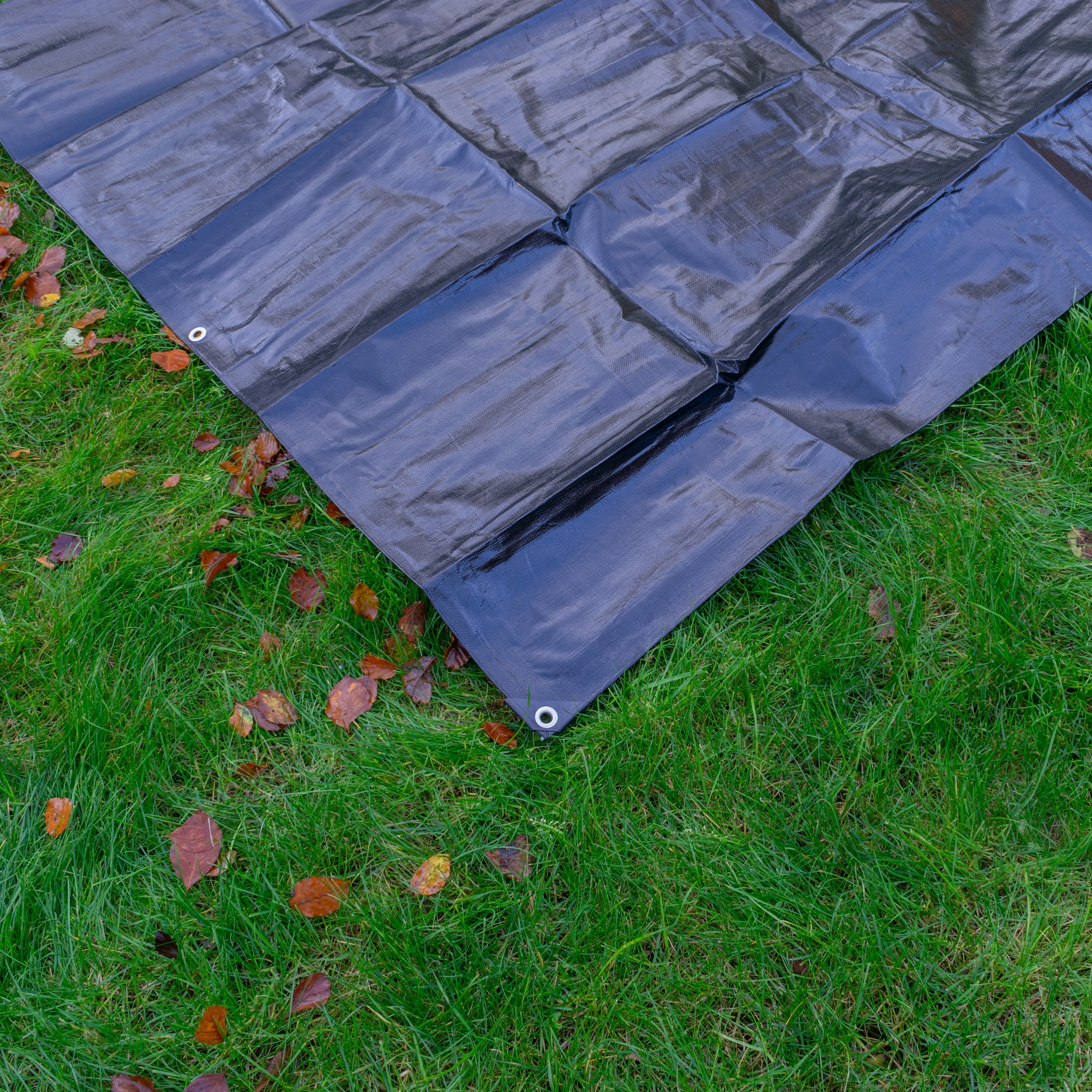 Black/Silver L-Grade Tarpaulin with 10m of 6mm Bungee Rope and 10 x Screw Type Tarp Clips